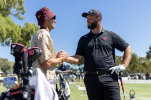 Jon Rahm und FISHER an der Driving Range